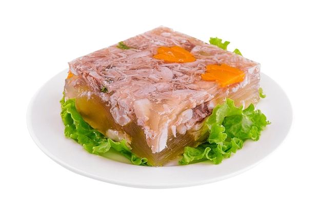 Cold appetizer portioned jelly of pork beef and chicken on white plate