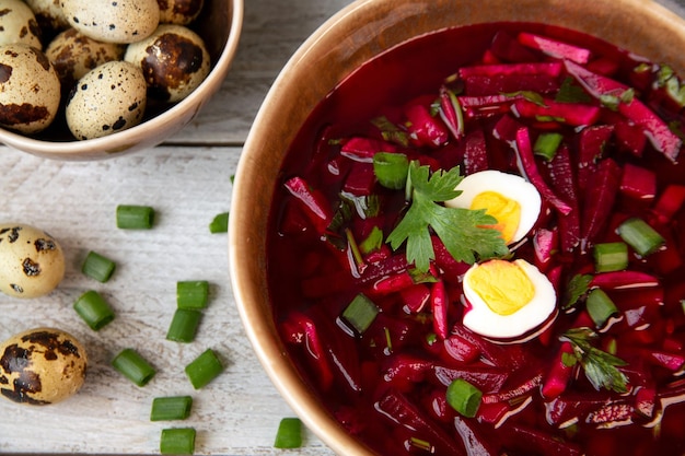 Cold beetroot soup with vegetables eggs herbs Traditional cuisine Healthy food Vegetarian food