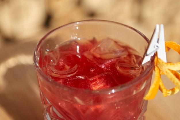 Cold coctails with lime mint and ice in a glass with drops alcohol drink at the bar