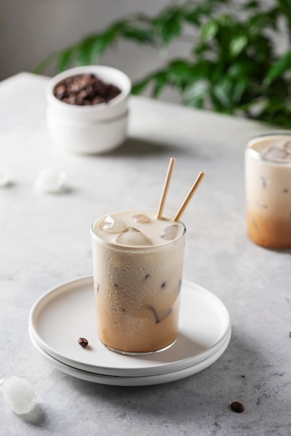 Cold coffee with ice and cream, selective focus image