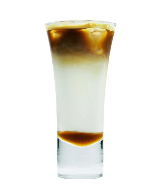 Cold coffee with ice in glass isolated on white