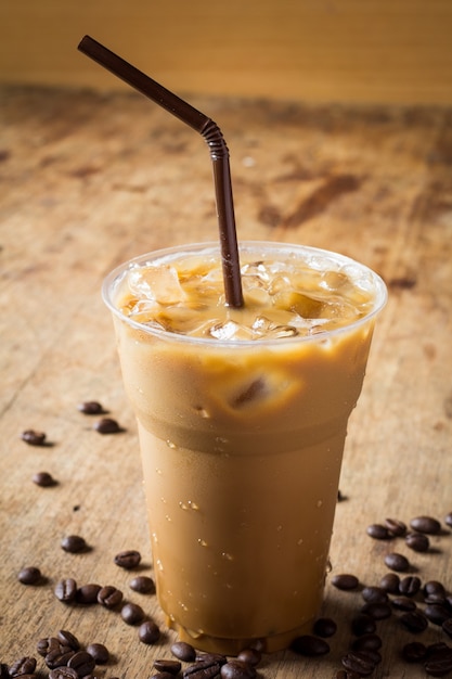 Cold coffee on wooden table