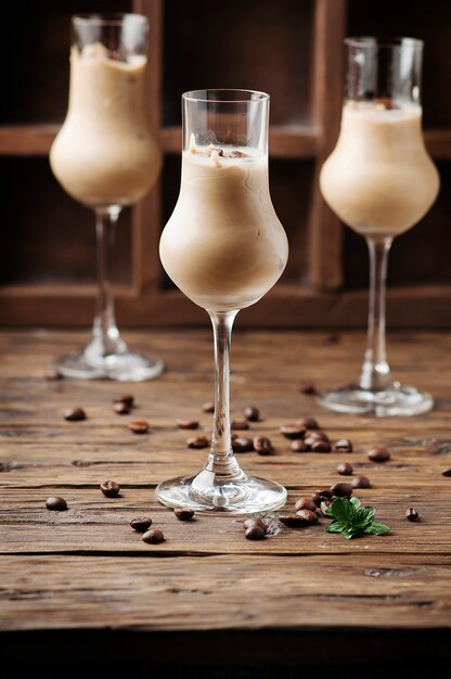 Cold cream with coffe and mint on the wooden table