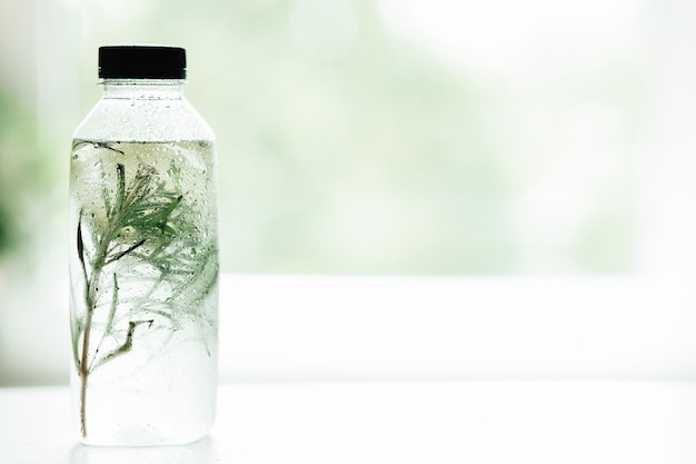 cold drink on a white table against the background of the window