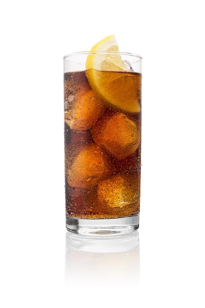 A cold glass of cola with ice cubes and lemon slice isolated on white background. Taken in Studio with a 5D mark III.