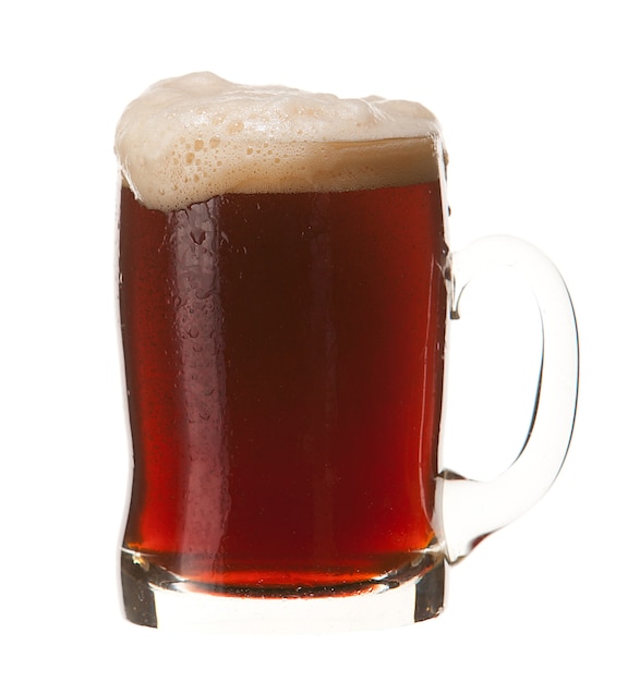 Cold mug of red beer with foam isolated on white background