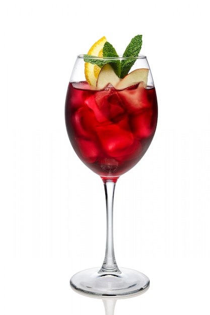 Cold sangria in a wine glass isolated on white.