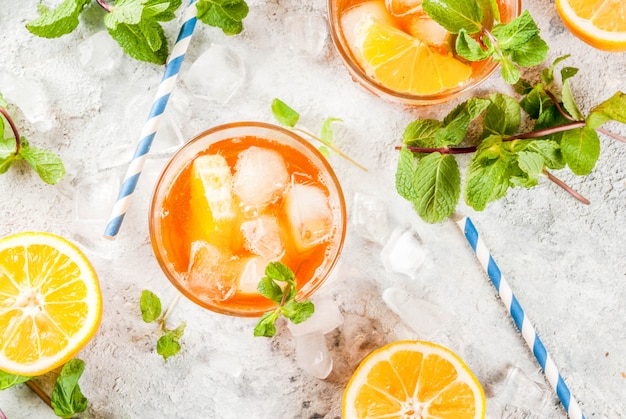 Cold summer drink. iced tea with lemon and mint