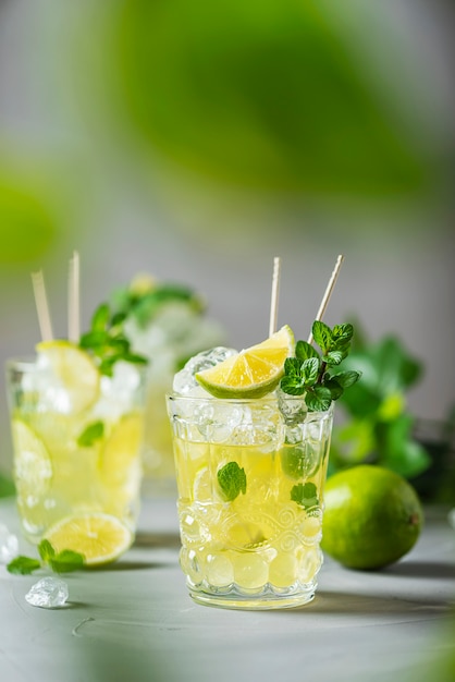 Cold tea with lime, mint and ice