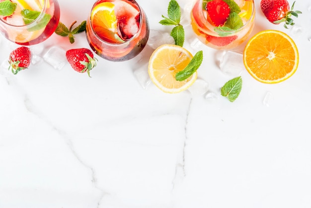 Cold white, pink and red sangria cocktails 