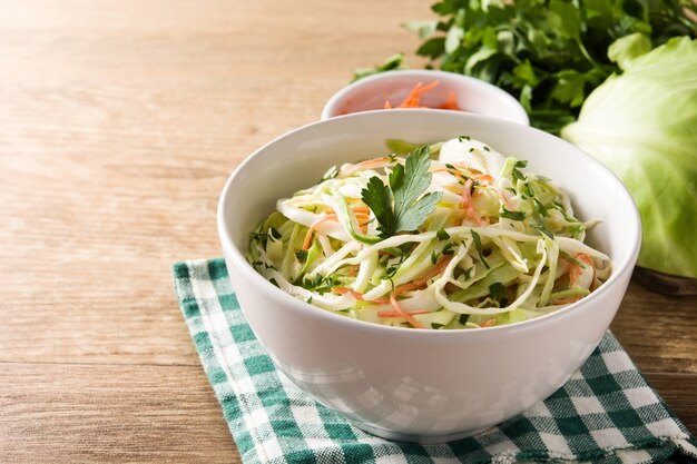 Coleslaw salad in white bowl