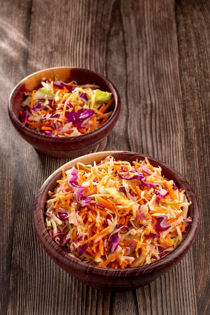 Coleslaw salad with white cabbage red cabbage and sliced\
carrots
