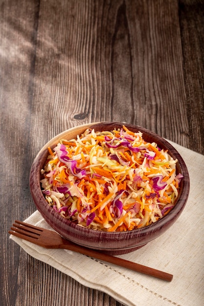 Coleslaw salad with white cabbage red cabbage and sliced\
carrots