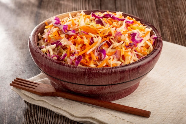 Coleslaw salad with white cabbage red cabbage and sliced carrots