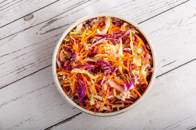 Coleslaw salad with white cabbage red cabbage and sliced\
carrots