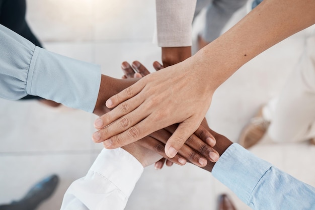 Collaboration team building and diversity stack hands together for support career motivation and company goal Corporate community and professional group hand sign for solidarity mission above