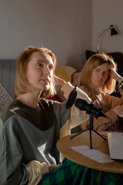 Collaborative Podcasting Two Women Recording at Home