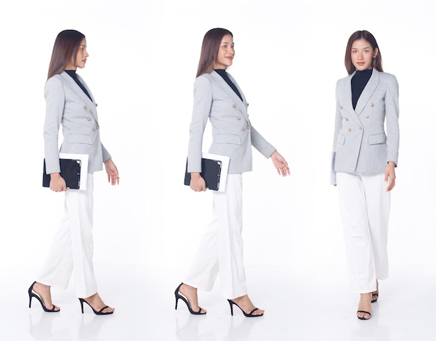 Collage Group Full length Figure snap of 20s Asian Woman brown hair business suit pant and high heels shoes. Female walk carry digital tablet check work social media over white Background isolated