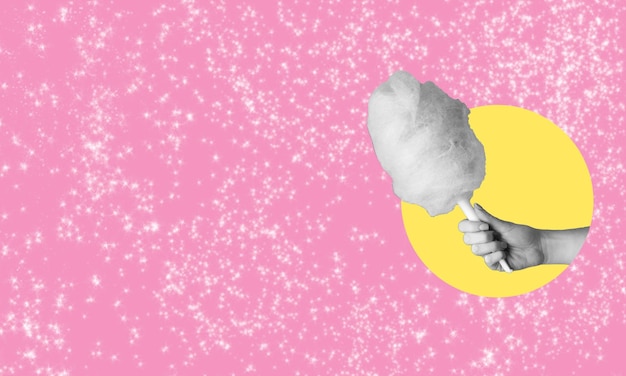 A collage of modern art Hand with cotton candy on pink background with space for text
