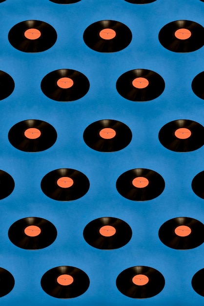 Collage of vinyl records on a blue background