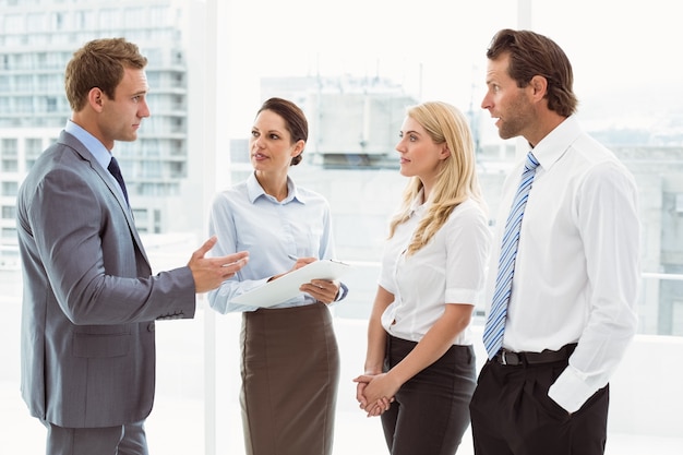 Colleagues in meeting at office