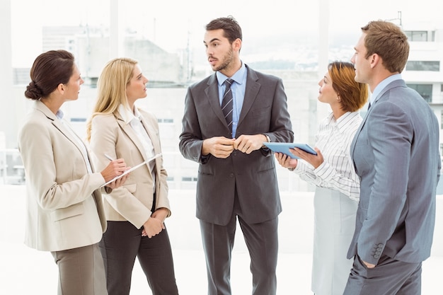 Colleagues in meeting at office