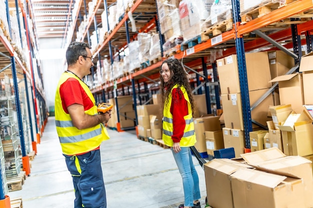 Colleagues talking in a corridor of distribution warehouse