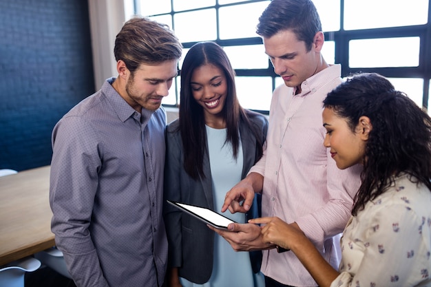 Colleagues using a tablet