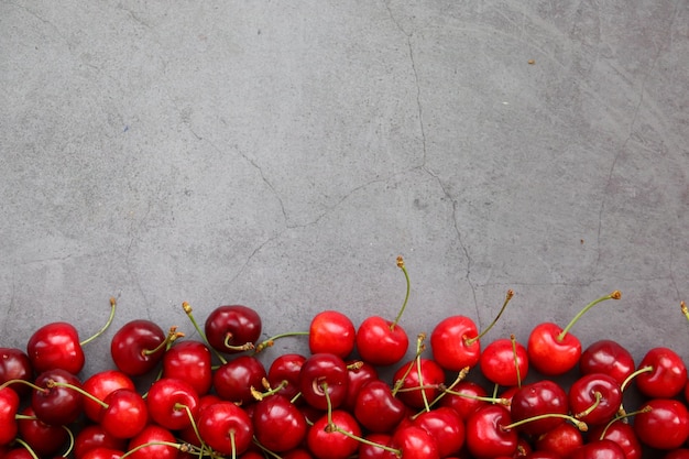 Collecting cherries in the garden The boxes are freshly picked red cherries Industrial cherry