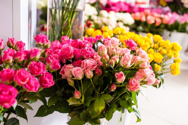 Collection of beautiful roses for sale at a floristic shop