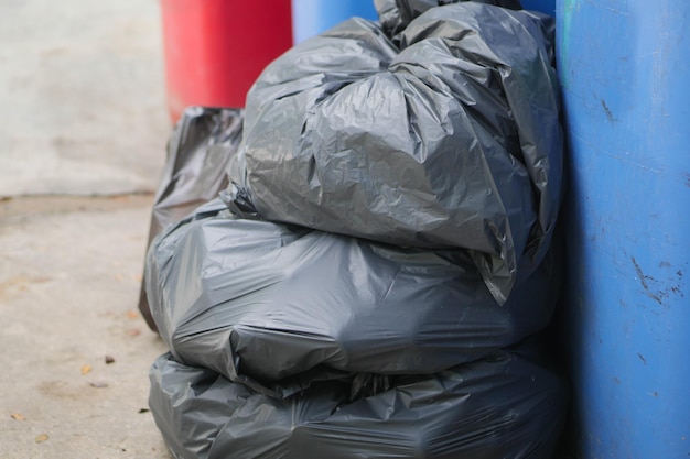 Collection of black color waste bins outdoor