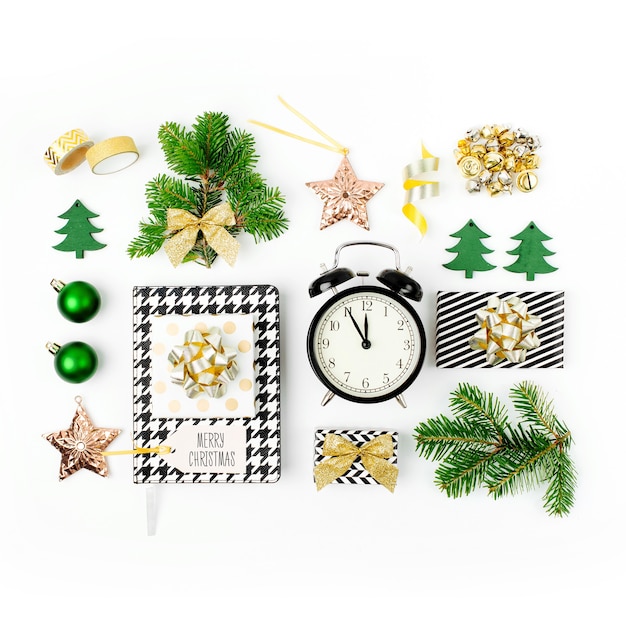 Collection of Christmas objects. Christmas  winter decorations, stationery with alarm clock and gifts on white background. Holiday and celebration creative concept. Flat lay, top view