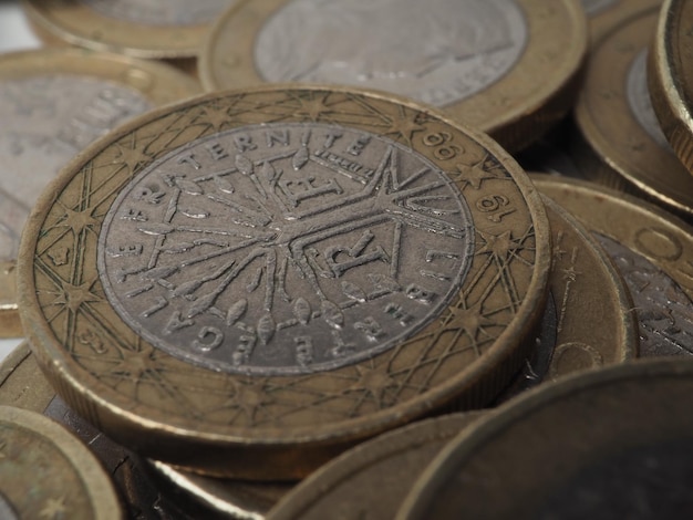 Photo a collection of coins with the year of the rooster on the front.