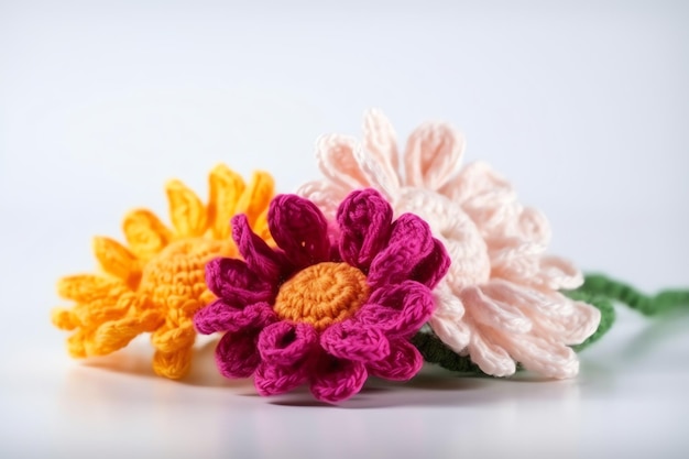 A collection of crochet flowers with a white background.