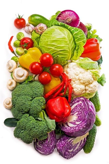 Collection of fresh vegetables Vegetarian diet food fresh vegetables isolated on white Tomatoes broccoli peppers mushrooms products for the organic market