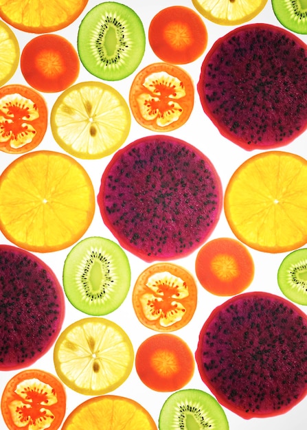 Collection of fruits and vegetables on a white background back lit