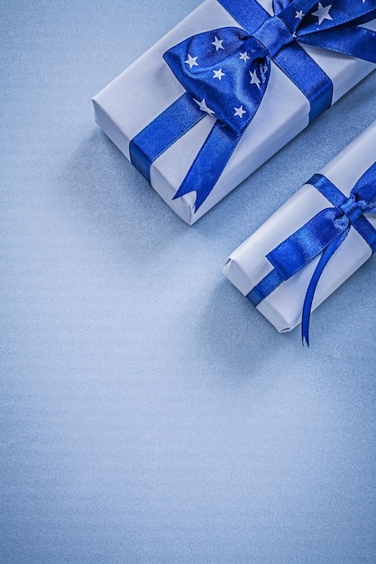 Collection of gift boxes on blue background holidays concept