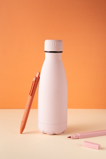 Collection of office supplies in pastel and neutral colors