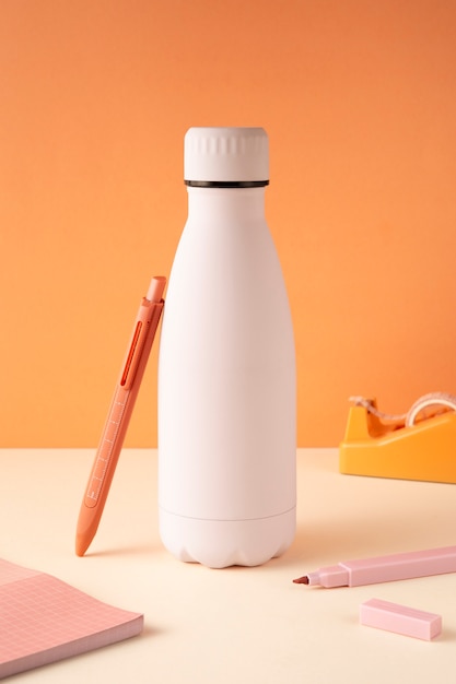 Collection of office supplies in pastel and neutral colors