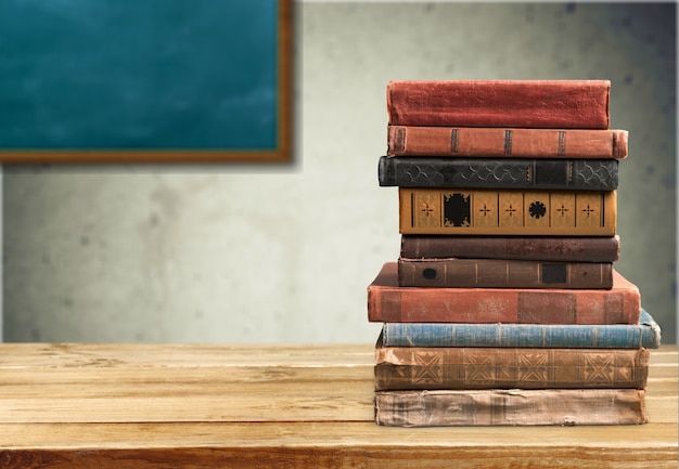 Collection of old books  on background