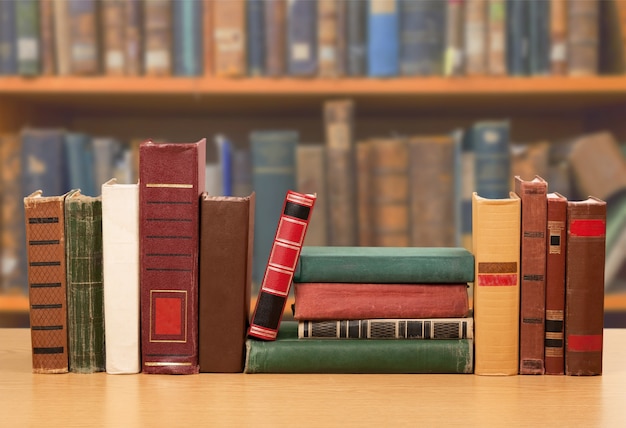 Collection of old books  on background