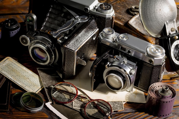A collection of old cameras and other items including a camera.
