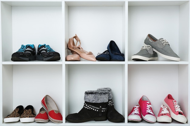 Collection of shoes on shelves