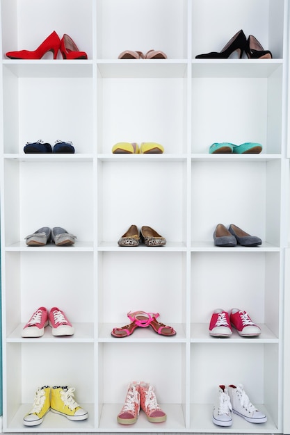 Collection of shoes on shelves