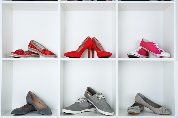 Collection of shoes on shelves