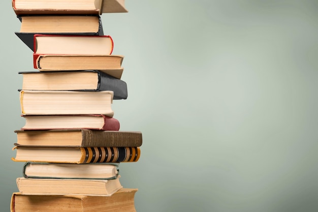 Collection stack of old retro books on background