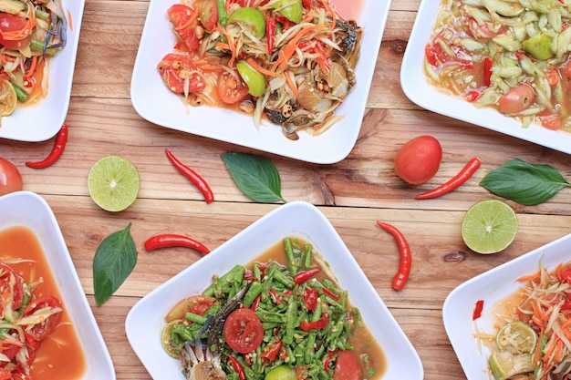 Collection of thai food on wood floor