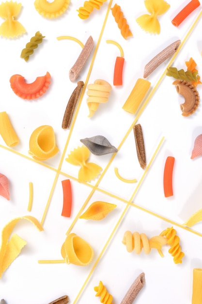 Collection of various types of pasta on white background