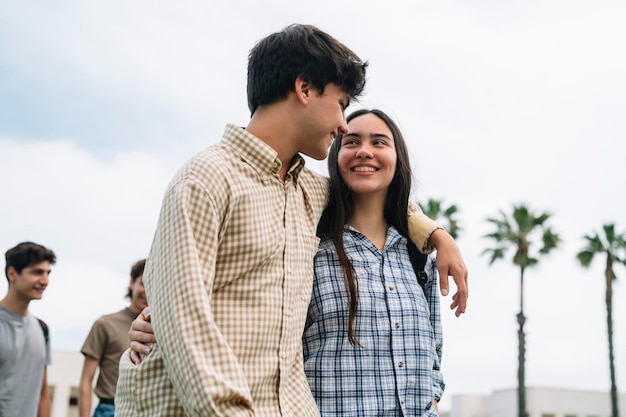 College couple walking on campus