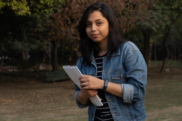 College student with books and bag